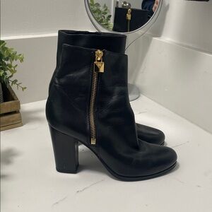 MICHAEL Michael Kors Black Boots with Gold Accent